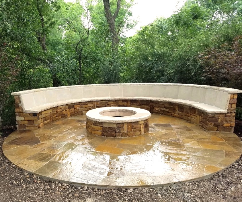 Custom campfire seating area by Fowler Custom Exteriors